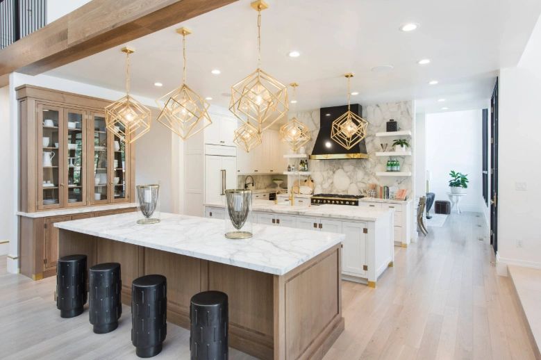 Luxury remodeled kitchen with marble island and custom cabinetry in Tampa Bay